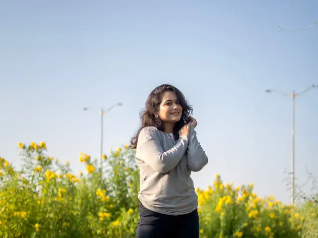 A woman on a brisk morning walk outdoors for steady weight loss